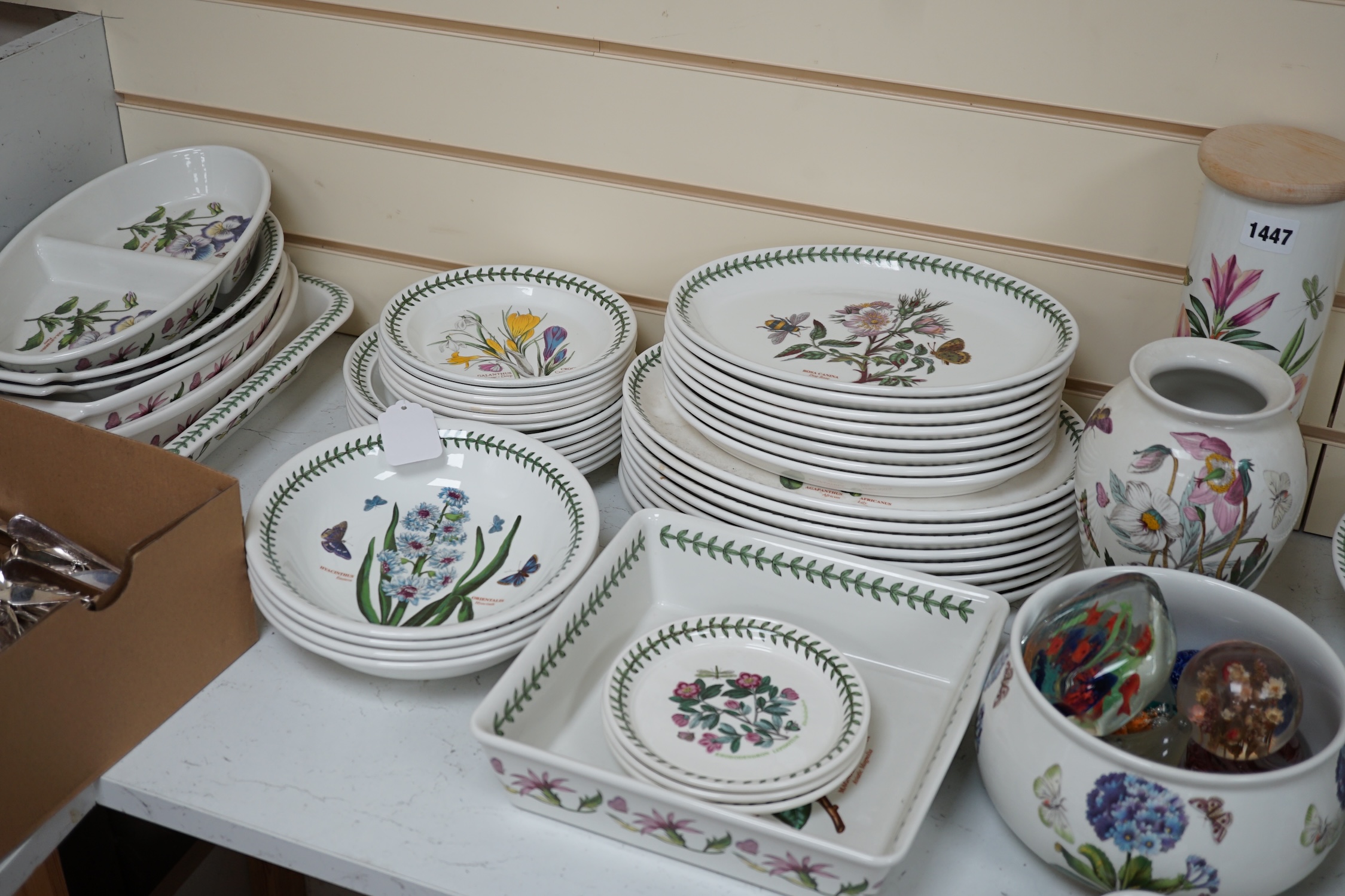 A large quantity of Portmeirion 'Botanic Gardens' tea, dinner and kitchen wares, together with cutlery and seven glass paperweights